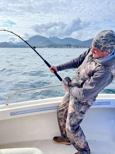 Isaac-bringing-in-a-monster-halibut